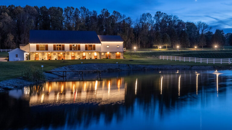 Philadelphia wedding venue lakeside outdoor ceremony with luxury chairs, natural beauty and views of the Lancaster Pennsylvania countryside