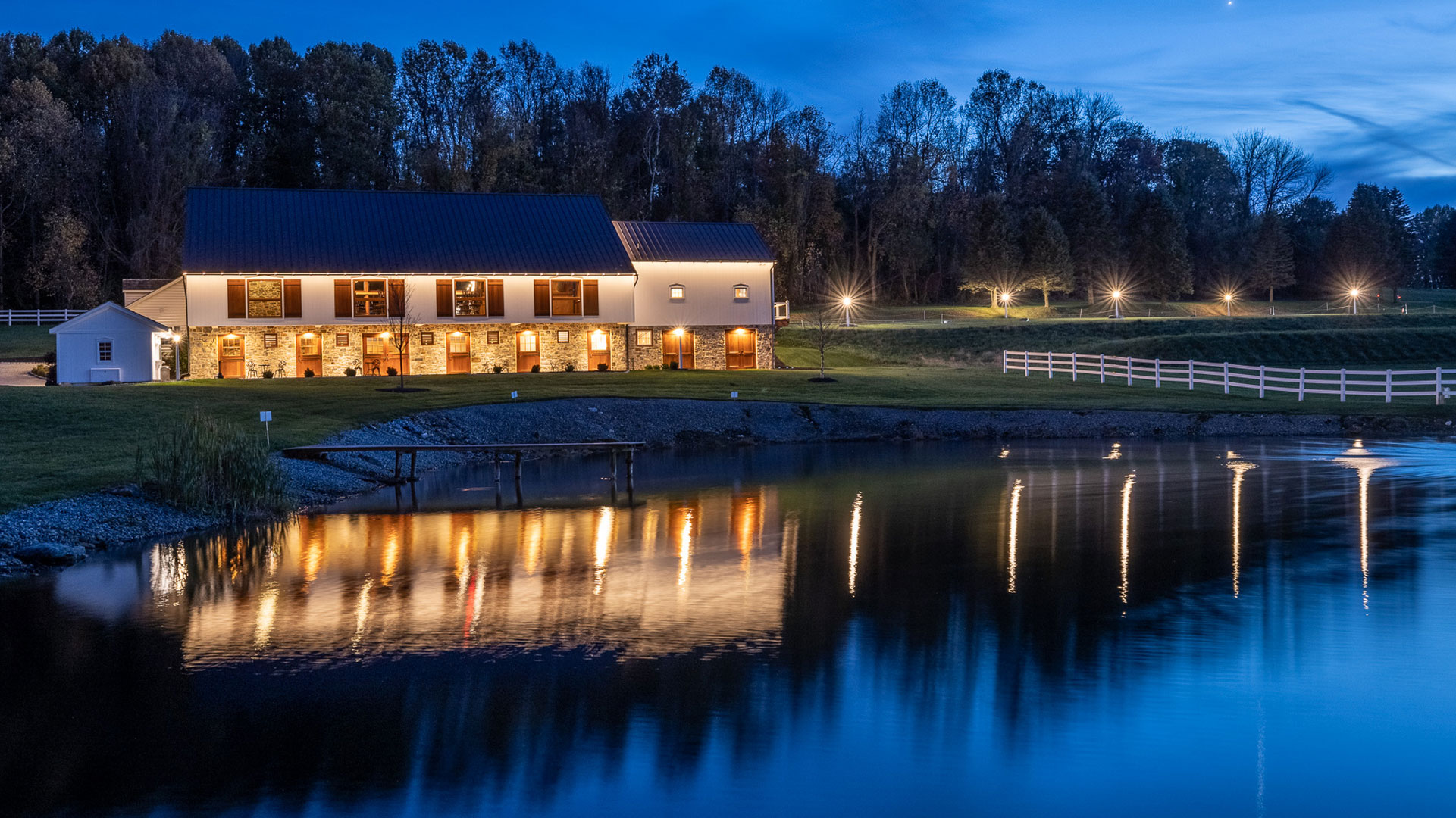 Philadelphia wedding venue lakeside outdoor ceremony with luxury chairs, natural beauty and views of the Lancaster Pennsylvania countryside
