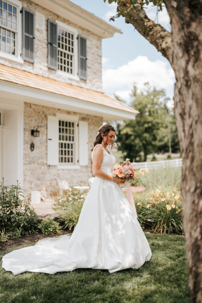 bride with flowers at bluestone estate