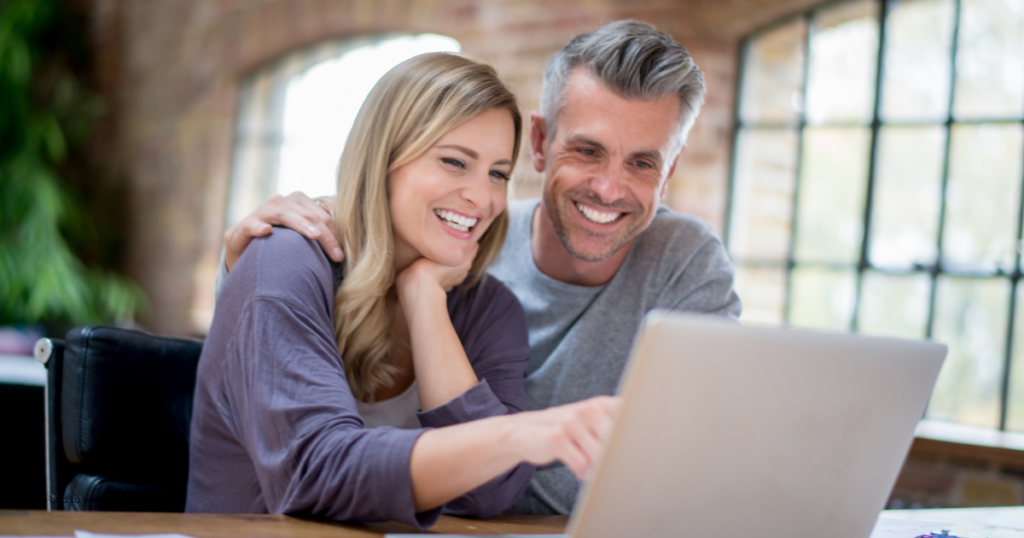 Bride and groom creating a free wedding website and RSVP System to manage wedding guest RSVP's