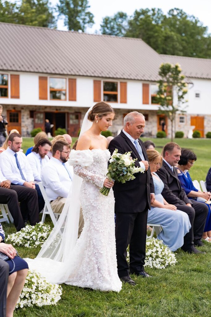 Bride and father of the bride walking down the aisle at our historic wedding venue near Philadelphia