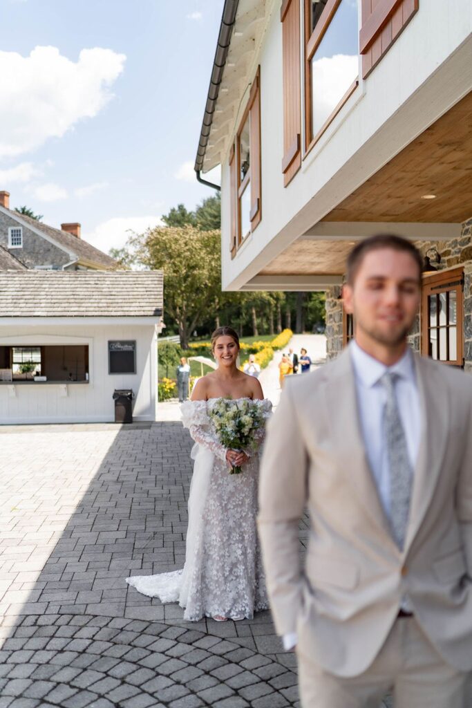 Bride and groom enjoying a first look at our historic wedding venue near Philadelphia